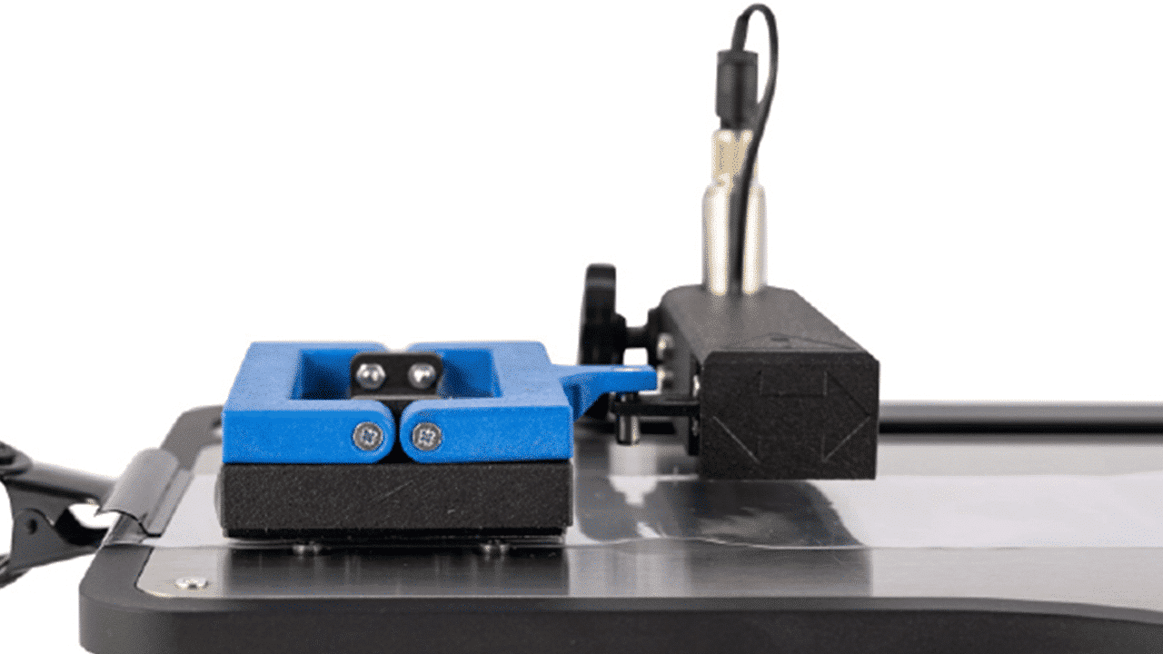 Universal Friction Tester - Placement pins retract into the instrument; the test is ready to begin